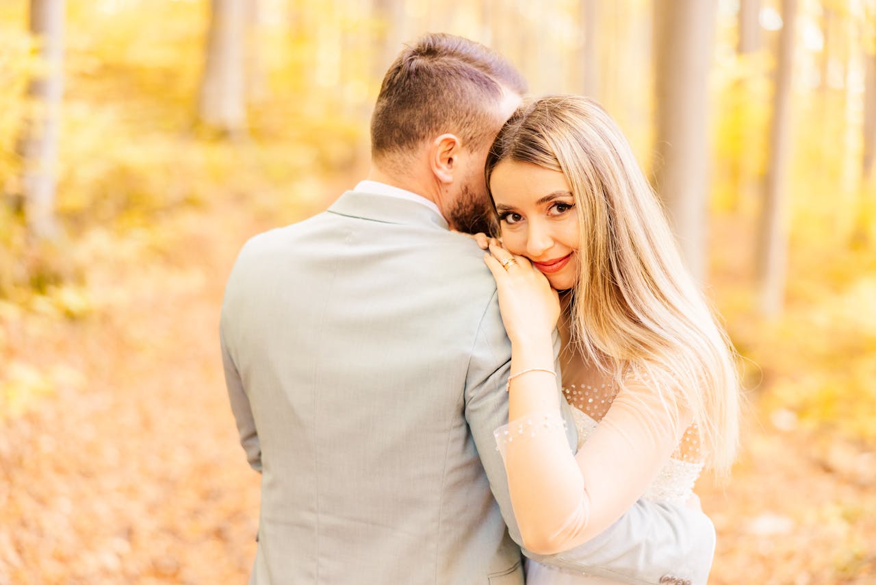 A romantic couple walking in Edmonton’s River Valley at sunset, symbolizing meaningful local relationships.
